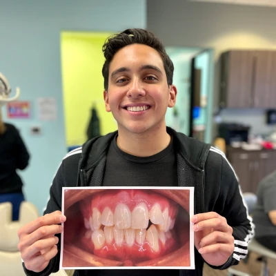 Teen Holding Braces Before & After 6